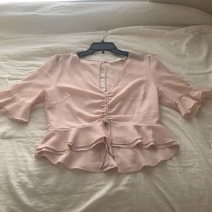 Light pink peplum top